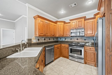 Welcome to this delightful one-level home located next to the on Coronado Golf Course in Arkansas - for sale on GolfHomes.com, golf home, golf lot