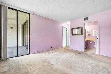 DRASTICALLY REDUCED! ESTATE SALE, This in-demand first floor 2 on Woodmont Country Club in Florida - for sale on GolfHomes.com, golf home, golf lot