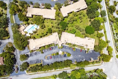 DRASTICALLY REDUCED! ESTATE SALE, This in-demand first floor 2 on Woodmont Country Club in Florida - for sale on GolfHomes.com, golf home, golf lot