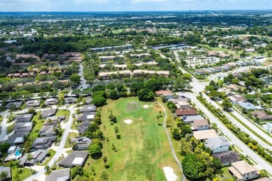 DRASTICALLY REDUCED! ESTATE SALE, This in-demand first floor 2 on Woodmont Country Club in Florida - for sale on GolfHomes.com, golf home, golf lot