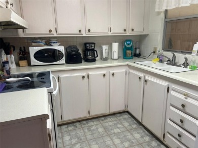 READY TO GO!  This spacious Florida home is ready for a new on Largo Golf Course in Florida - for sale on GolfHomes.com, golf home, golf lot