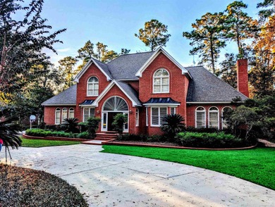 Welcome Home to Golden Eagle's Finest! Nestled within the on Golden Eagle Country Club in Florida - for sale on GolfHomes.com, golf home, golf lot