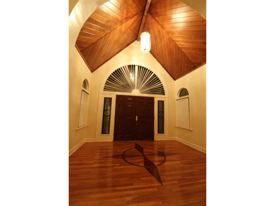 Welcome Home to Golden Eagle's Finest! Nestled within the on Golden Eagle Country Club in Florida - for sale on GolfHomes.com, golf home, golf lot