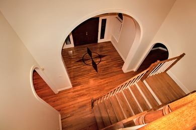 Welcome Home to Golden Eagle's Finest! Nestled within the on Golden Eagle Country Club in Florida - for sale on GolfHomes.com, golf home, golf lot