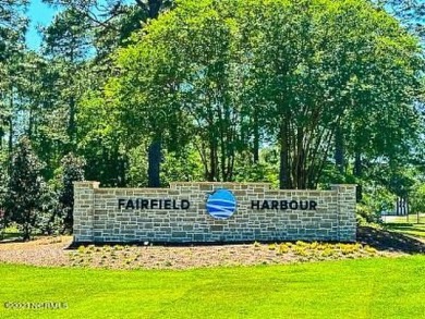 Introducing an extraordinary opportunity to own a luxurious on Harbour Point Golf Club in North Carolina - for sale on GolfHomes.com, golf home, golf lot