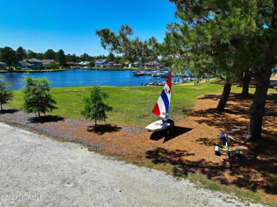 Introducing an extraordinary opportunity to own a luxurious on Harbour Point Golf Club in North Carolina - for sale on GolfHomes.com, golf home, golf lot