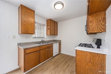 This beautifully updated 3-bedroom, 2-bathroom home offers 1,214 on Oak Tree Country Club in California - for sale on GolfHomes.com, golf home, golf lot