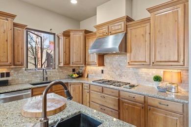 This gorgeous home blends indoors and outdoors with the many on Entrada at Snow Canyon in Utah - for sale on GolfHomes.com, golf home, golf lot