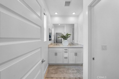 Experience modern luxury in this pristine Anaheim townhome on Dad Miller Golf Course in California - for sale on GolfHomes.com, golf home, golf lot