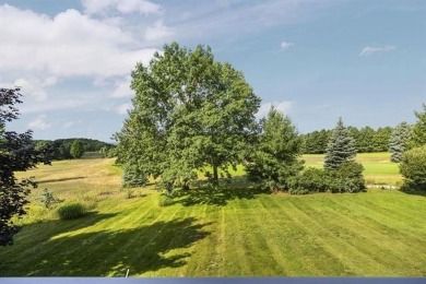 Welcome to your dream retreat at 5668 Golf Meadows Drive in on Shanty Creek Golf Course in Michigan - for sale on GolfHomes.com, golf home, golf lot