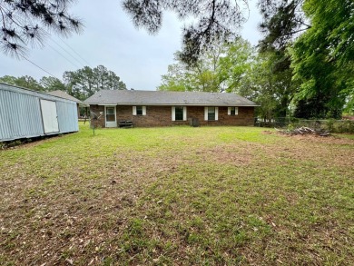 This charming brick home is nestled on 1 acre in a peaceful area on Cypress Bend Golf Resort in Louisiana - for sale on GolfHomes.com, golf home, golf lot