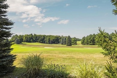 Welcome to your dream retreat at 5668 Golf Meadows Drive in on Shanty Creek Golf Course in Michigan - for sale on GolfHomes.com, golf home, golf lot