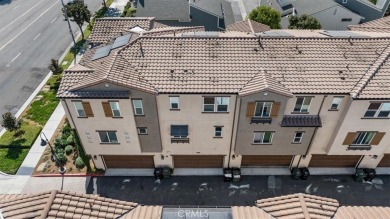 Experience modern luxury in this pristine Anaheim townhome on Dad Miller Golf Course in California - for sale on GolfHomes.com, golf home, golf lot