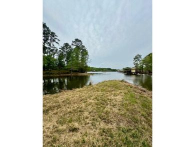 This charming brick home is nestled on 1 acre in a peaceful area on Cypress Bend Golf Resort in Louisiana - for sale on GolfHomes.com, golf home, golf lot