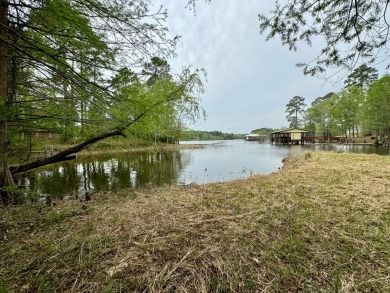 This charming brick home is nestled on 1 acre in a peaceful area on Cypress Bend Golf Resort in Louisiana - for sale on GolfHomes.com, golf home, golf lot