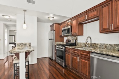 Welcome to this beautiful, newly painted all-white 2nd-floor on Hansen Dam Golf Course in California - for sale on GolfHomes.com, golf home, golf lot