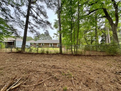 This charming brick home is nestled on 1 acre in a peaceful area on Cypress Bend Golf Resort in Louisiana - for sale on GolfHomes.com, golf home, golf lot