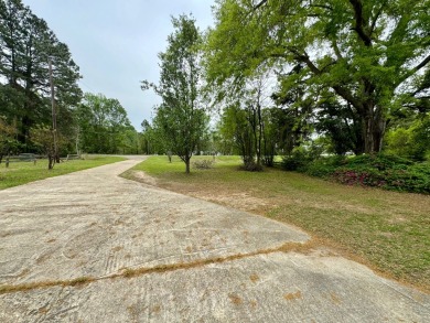 This charming brick home is nestled on 1 acre in a peaceful area on Cypress Bend Golf Resort in Louisiana - for sale on GolfHomes.com, golf home, golf lot