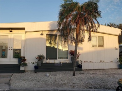 Great doublewide manufactured home on owned land with a private on Pelicans Nest Golf Club in Florida - for sale on GolfHomes.com, golf home, golf lot