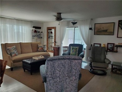 Great doublewide manufactured home on owned land with a private on Pelicans Nest Golf Club in Florida - for sale on GolfHomes.com, golf home, golf lot