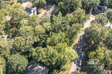 Great Buildable Lot in the popular Lake Forest Subdivision in on Lake Forest Yacht and Country Club in Alabama - for sale on GolfHomes.com, golf home, golf lot