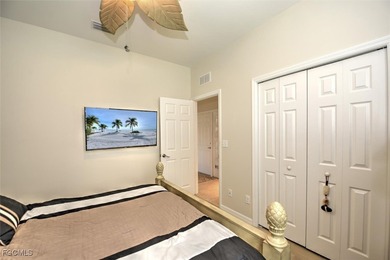 Turnkey with stunning lake and golf course views! This home on Herons Glen Golf and Country Club in Florida - for sale on GolfHomes.com, golf home, golf lot