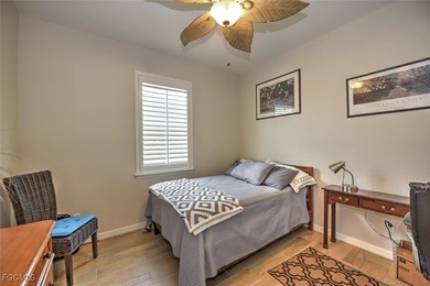 Turnkey with stunning lake and golf course views! This home on Herons Glen Golf and Country Club in Florida - for sale on GolfHomes.com, golf home, golf lot