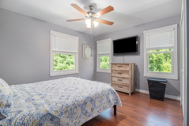 This terrific contemporary home gets a retreat like setting in on Whispering Pines Golf  in Michigan - for sale on GolfHomes.com, golf home, golf lot