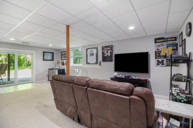 This terrific contemporary home gets a retreat like setting in on Whispering Pines Golf  in Michigan - for sale on GolfHomes.com, golf home, golf lot