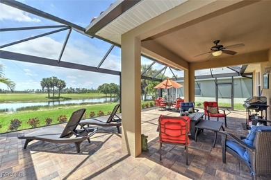 Turnkey with stunning lake and golf course views! This home on Herons Glen Golf and Country Club in Florida - for sale on GolfHomes.com, golf home, golf lot