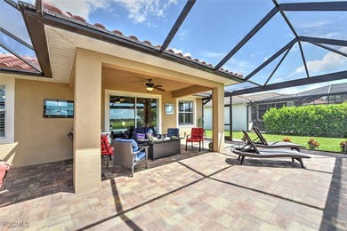 Turnkey with stunning lake and golf course views! This home on Herons Glen Golf and Country Club in Florida - for sale on GolfHomes.com, golf home, golf lot