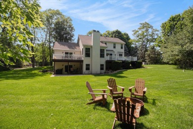 This terrific contemporary home gets a retreat like setting in on Whispering Pines Golf  in Michigan - for sale on GolfHomes.com, golf home, golf lot