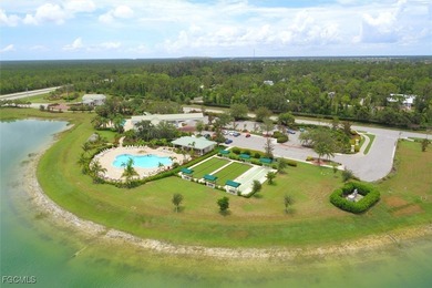 Turnkey with stunning lake and golf course views! This home on Herons Glen Golf and Country Club in Florida - for sale on GolfHomes.com, golf home, golf lot