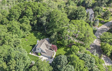 This terrific contemporary home gets a retreat like setting in on Whispering Pines Golf  in Michigan - for sale on GolfHomes.com, golf home, golf lot