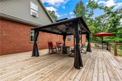 Welcome to your private escape in Bella Vista, Arkansas! Tucked on Bella Vista Country Club - Highlands in Arkansas - for sale on GolfHomes.com, golf home, golf lot