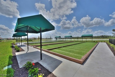 Turnkey with stunning lake and golf course views! This home on Herons Glen Golf and Country Club in Florida - for sale on GolfHomes.com, golf home, golf lot