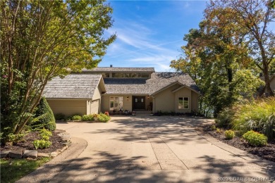 Water everywhere you look!Located in 6 Mile Cove, on one of the on Seasons Ridge At Four Seasons in Missouri - for sale on GolfHomes.com, golf home, golf lot