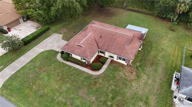 This house may be older, but it has good bones and has been on LakeSide Country Club in Florida - for sale on GolfHomes.com, golf home, golf lot