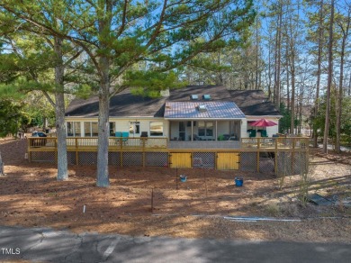 Beautiful 3-bedroom, 2-bath ranch-style home that sits on a on Carolina Trace Country Club in North Carolina - for sale on GolfHomes.com, golf home, golf lot