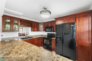 Enjoy resort-style living at an unbeatable price in the vibrant on Wynmoor Golf Course in Florida - for sale on GolfHomes.com, golf home, golf lot