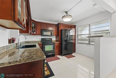 Enjoy resort-style living at an unbeatable price in the vibrant on Wynmoor Golf Course in Florida - for sale on GolfHomes.com, golf home, golf lot