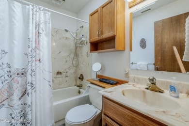 This charming 3-bedroom, 2-bath home offers red rock views and on Sedona Golf Resort in Arizona - for sale on GolfHomes.com, golf home, golf lot