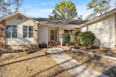 Beautiful 3-bedroom, 2-bath ranch-style home that sits on a on Carolina Trace Country Club in North Carolina - for sale on GolfHomes.com, golf home, golf lot