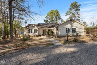 Beautiful 3-bedroom, 2-bath ranch-style home that sits on a on Carolina Trace Country Club in North Carolina - for sale on GolfHomes.com, golf home, golf lot