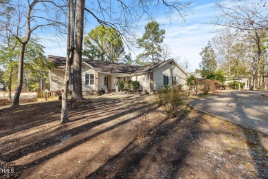 Beautiful 3-bedroom, 2-bath ranch-style home that sits on a on Carolina Trace Country Club in North Carolina - for sale on GolfHomes.com, golf home, golf lot