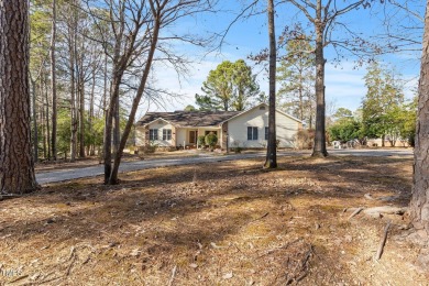 Beautiful 3-bedroom, 2-bath ranch-style home that sits on a on Carolina Trace Country Club in North Carolina - for sale on GolfHomes.com, golf home, golf lot