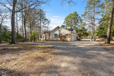 Beautiful 3-bedroom, 2-bath ranch-style home that sits on a on Carolina Trace Country Club in North Carolina - for sale on GolfHomes.com, golf home, golf lot