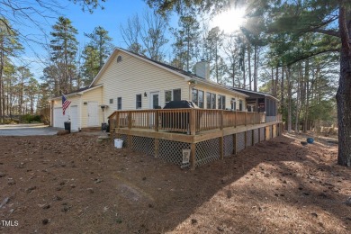Beautiful 3-bedroom, 2-bath ranch-style home that sits on a on Carolina Trace Country Club in North Carolina - for sale on GolfHomes.com, golf home, golf lot