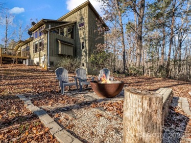 Modern farmhouse meets contemporary chic in this beautiful on Rumbling Bald Resort on Lake Lure in North Carolina - for sale on GolfHomes.com, golf home, golf lot