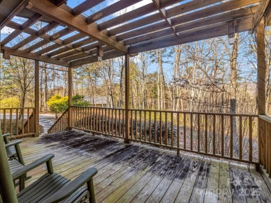 Modern farmhouse meets contemporary chic in this beautiful on Rumbling Bald Resort on Lake Lure in North Carolina - for sale on GolfHomes.com, golf home, golf lot